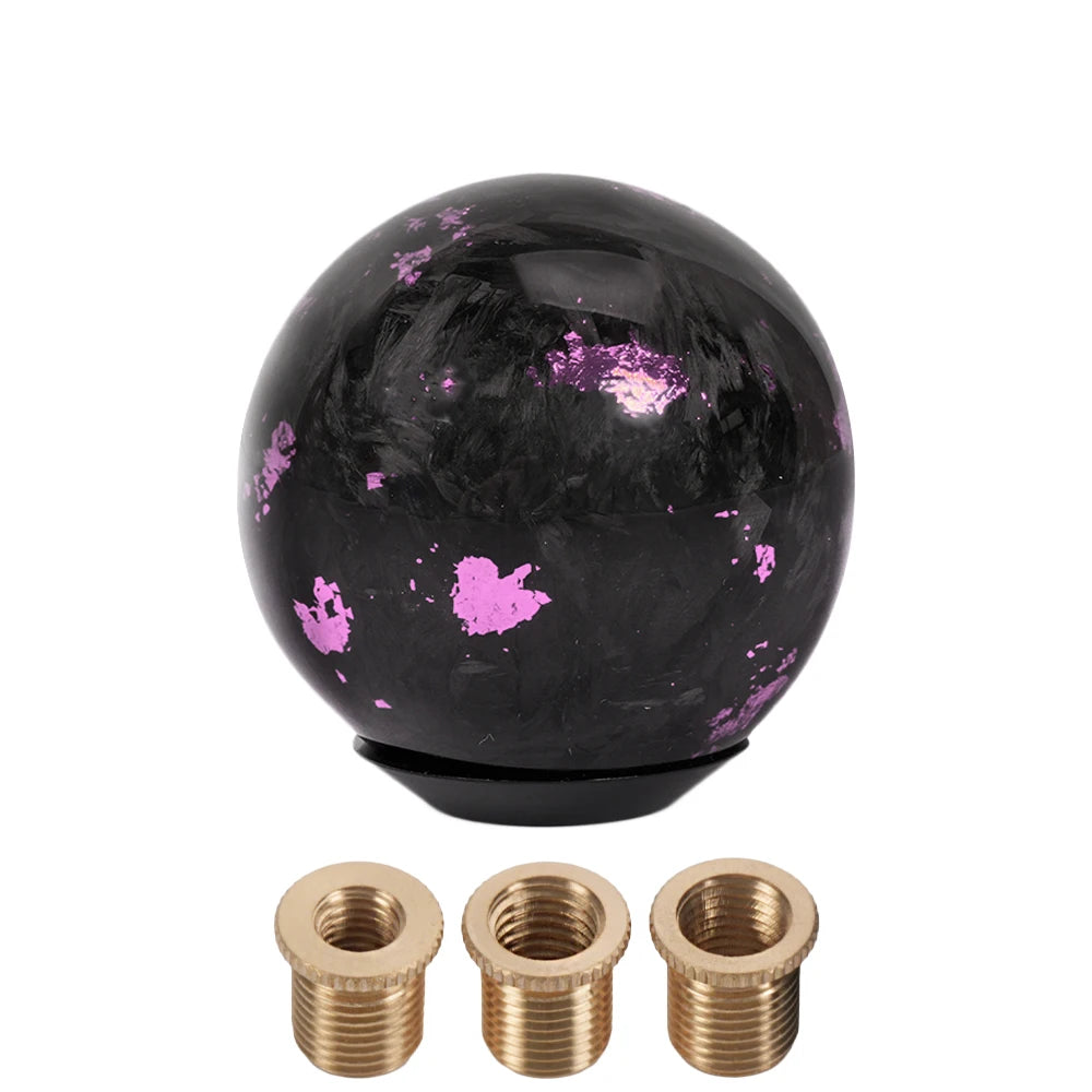 Black/pink marble shift knob with brass accents. Fits manual and automatic vehicles (SFN165). Carbon fiber construction. 58mm