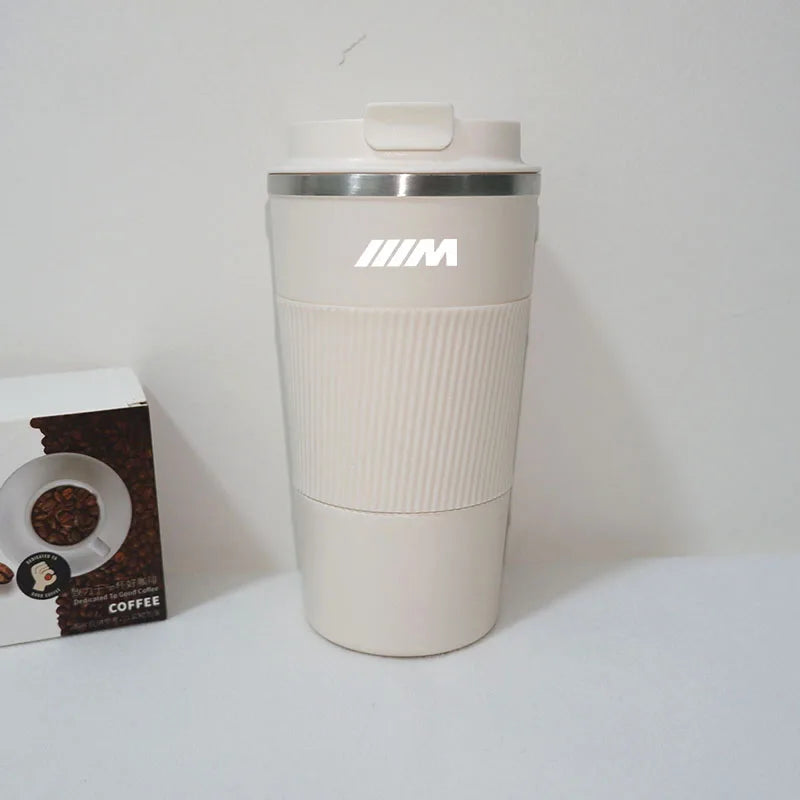White BMW M Sport travel mugs: one empty, one with coffee. Compatible with E-Series and F-Series models.