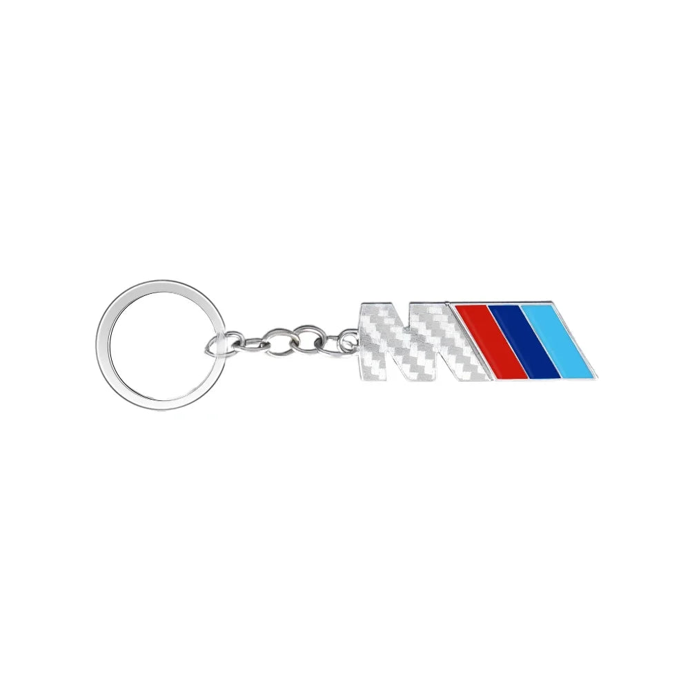 "BMW M logo metal keychain for E36, E39, and E46 models. Authentic BMW accessory for car keys."