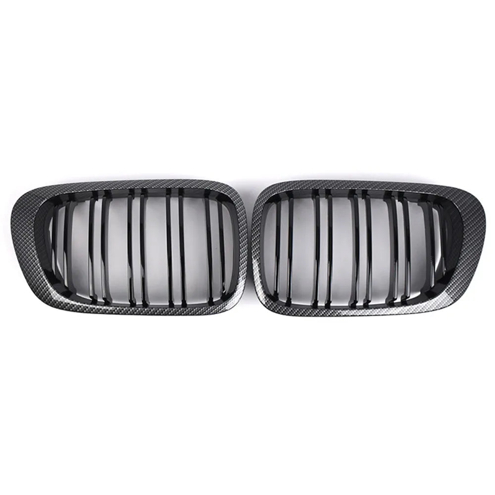 'BMW E46 M3 coupe double line kidney grille in carbon fiber. Replacement front bumper cover.'