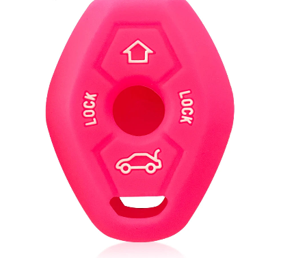 A pink silicone teething toy against a pristine white background.