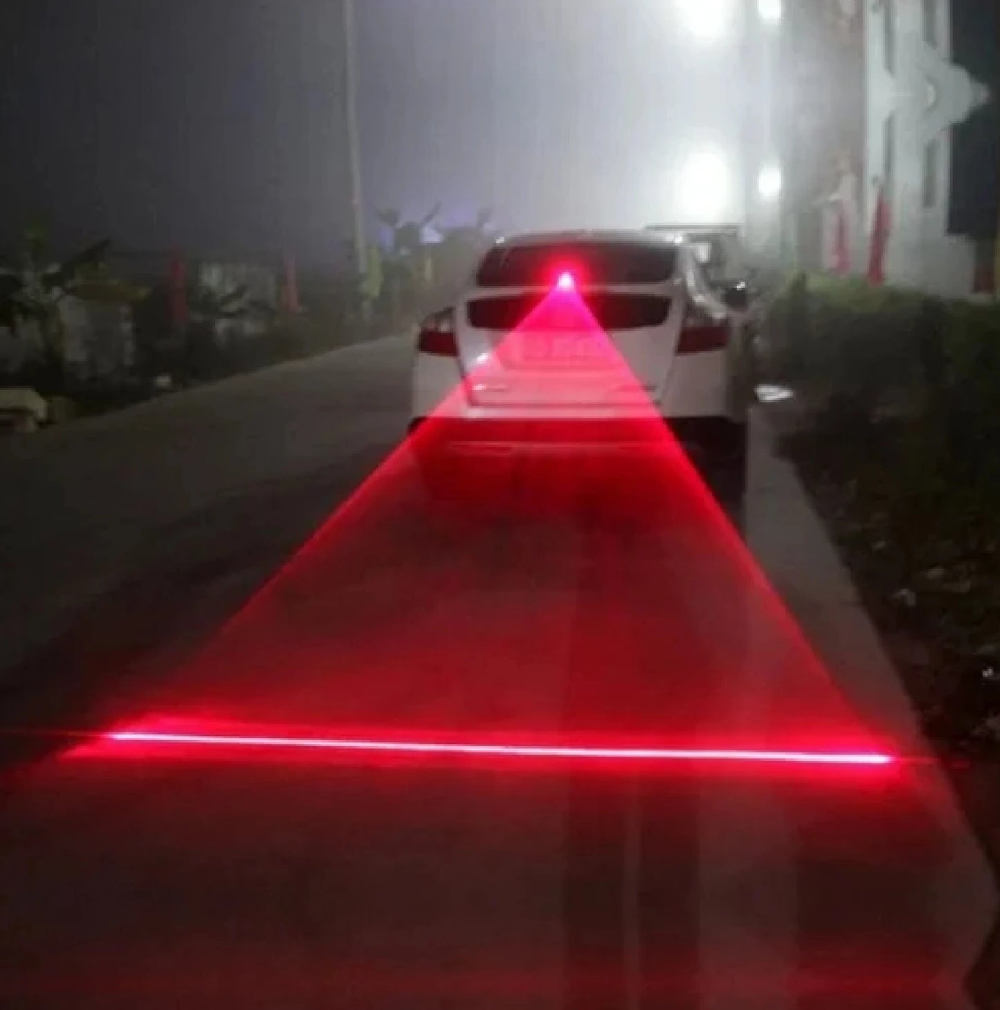 'Car with red LED laser lights, anti-fog/collision. Universal fit.'