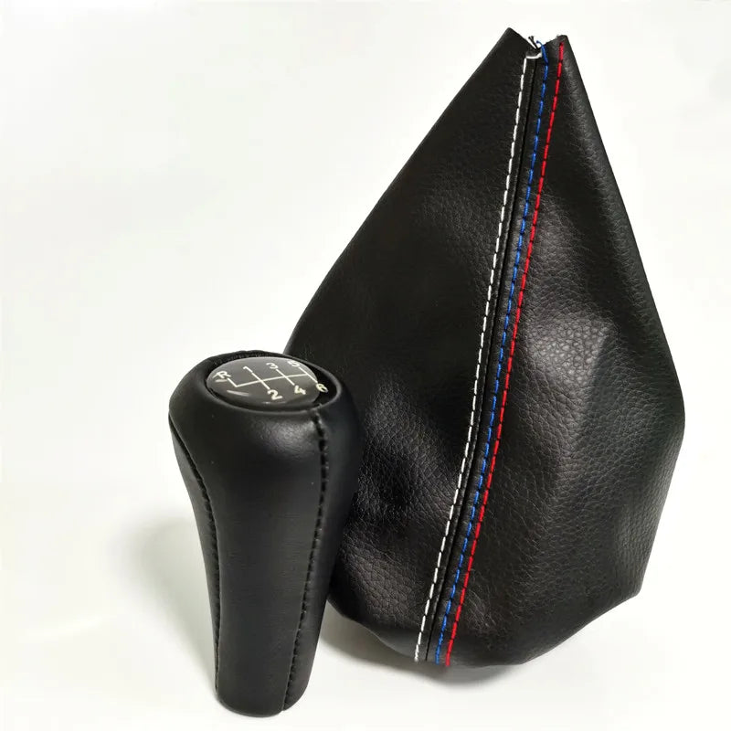 Black leather shift knob gaiter with red and blue accent stitching for BMW 3 Series, E30, E34, E36, E46, and M3 vehicles.