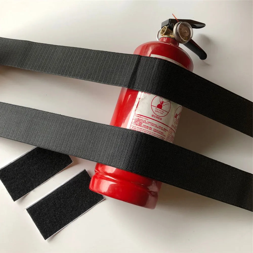 Set of 4 fire extinguisher belts for car trunk storage, includes adhesive mounting tape. Product: Fire Extinguisher Car Trunk
