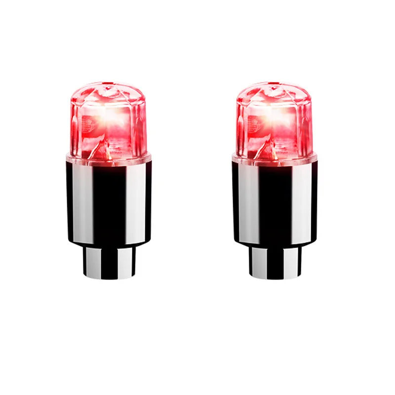 'Bike valve cap with integrated neon LEDs - pairs included. Red lights on white for visibility.'