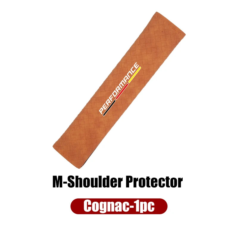 Brown shoulder pad cover for BMW E36, E39, and E46 models, enhancing seat belt comfort.