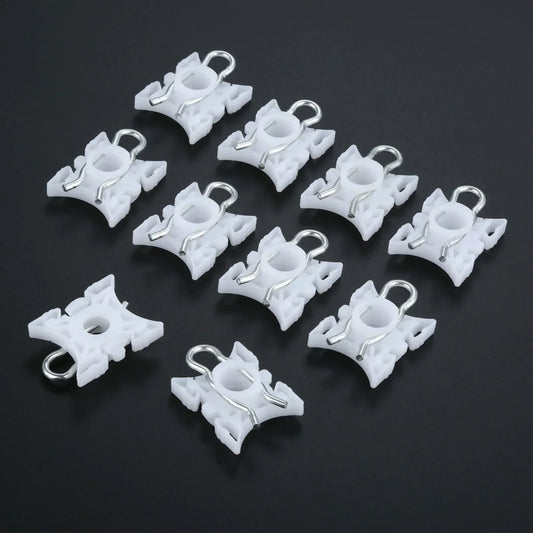 Ten white pivot clips for BMW E36 window regulators.
