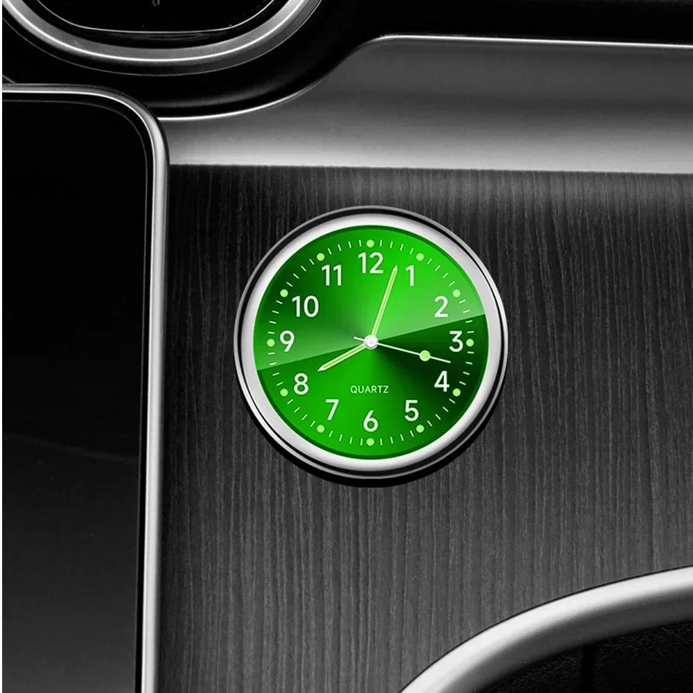 Mini Luminous Car Clock - Stick-on. Sleek design with glowing green dials for easy night viewing. Fits dashboard or mirror. G