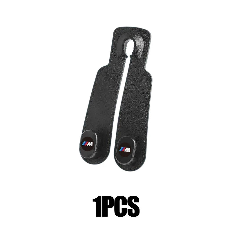 "BMW E36, E39, E46 car: Leather seat belt hanger hooks."