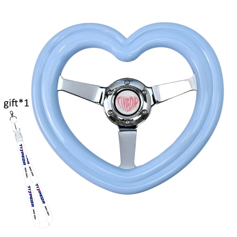 "Pink heart-shaped deep-dish steering wheel with diameter of 320mm and grip diameter of 40mm."