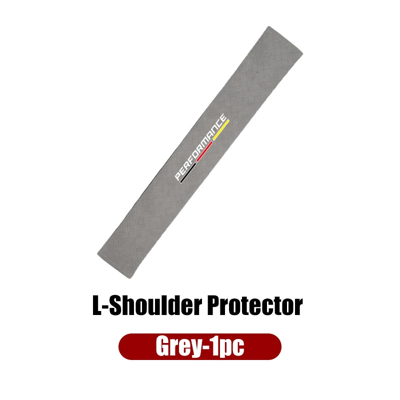 Grey seat belt shoulder pad cover for BMW E36, E39, and E46 models. Provides added comfort during long drives.