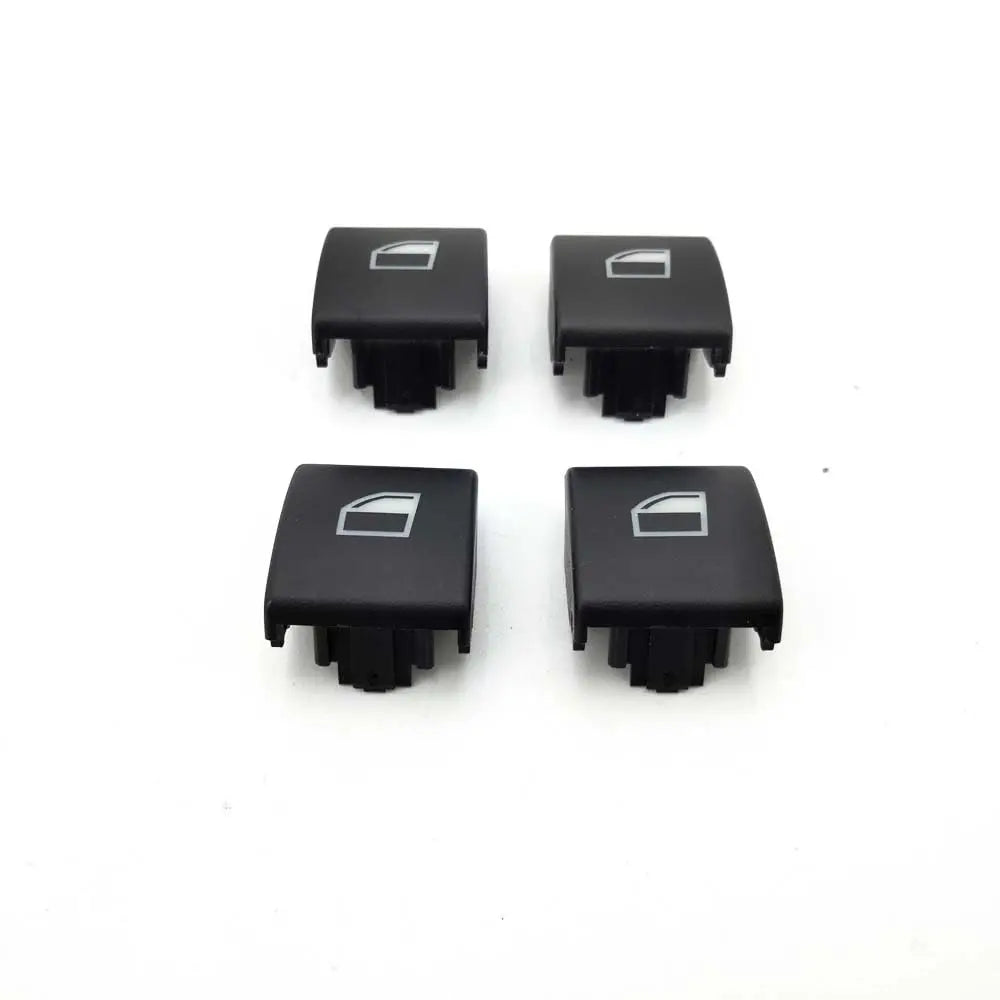 Set of 4 black door handle button caps for BMW E46 models (323i, 325i, 330i, M3).