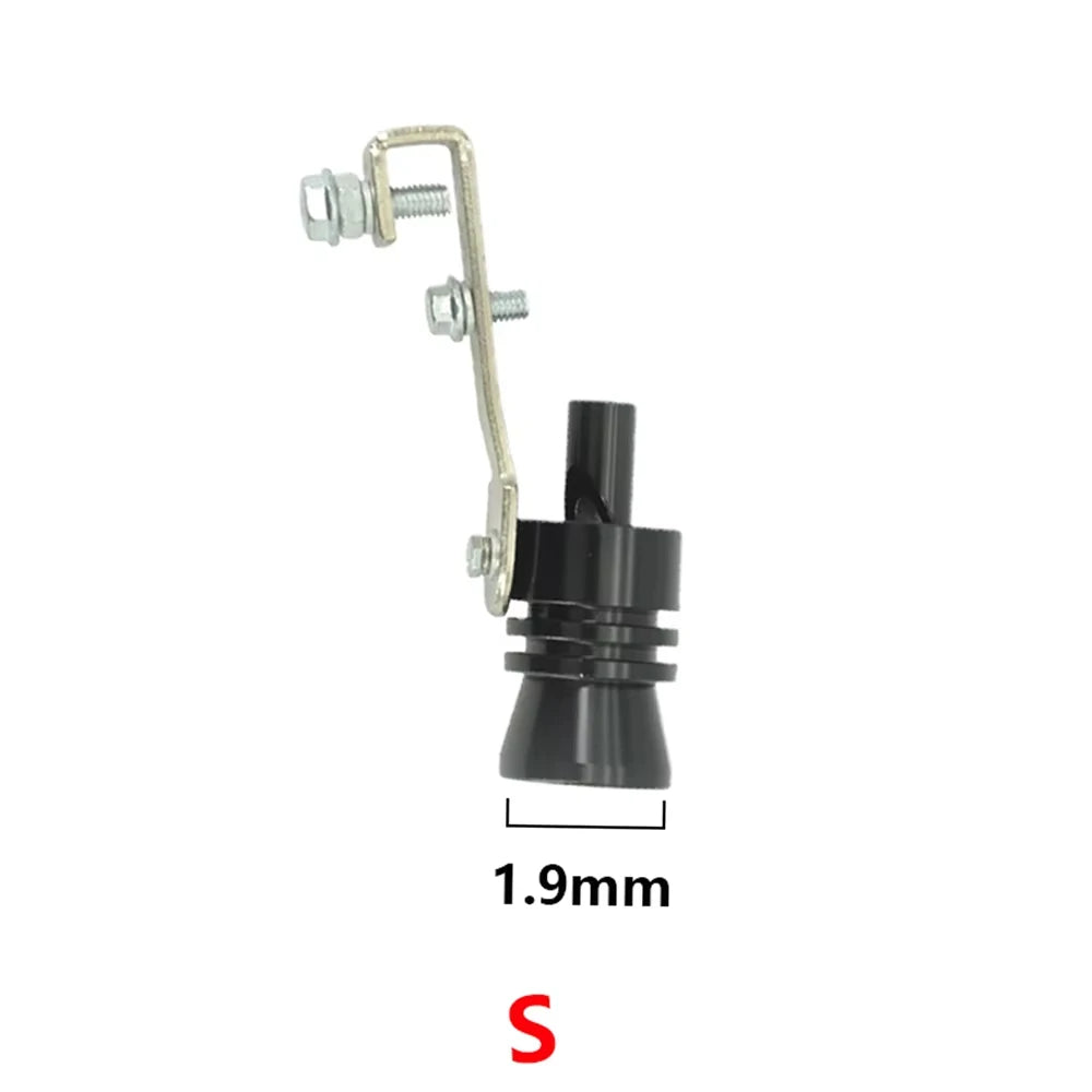 Black plastic mug-shaped car exhaust insert with metallic handle.