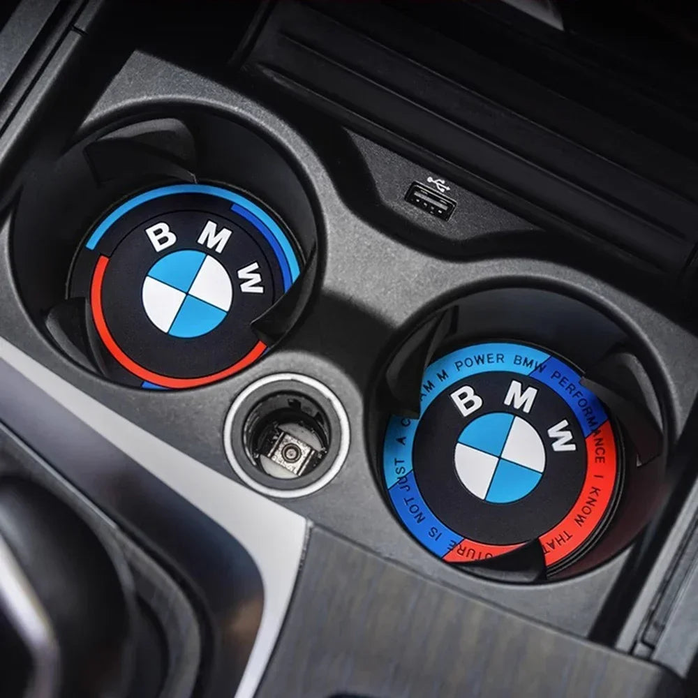 "BMW logo prominently displayed on the center console of the vehicle."