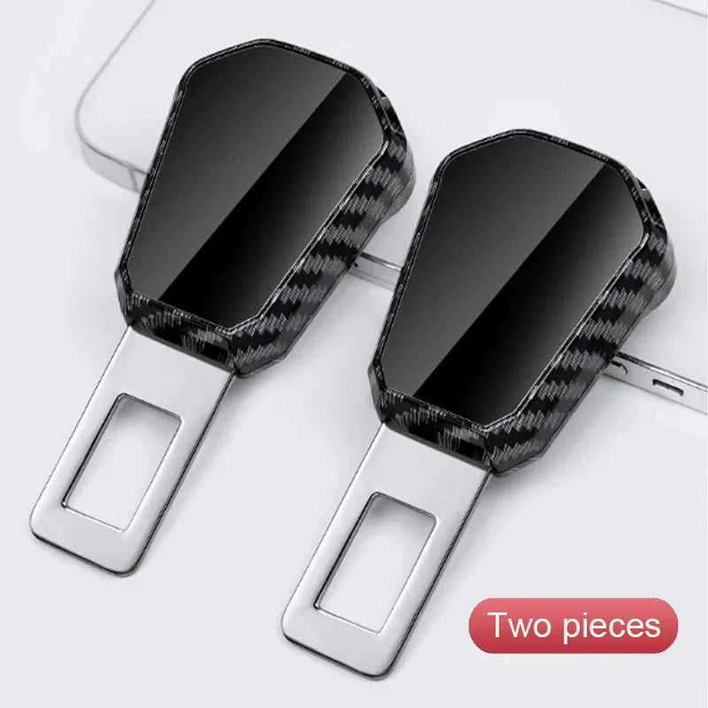 'Metal seat belt extender with carbon fiber clip. Compatible with auto interiors. Fits iPhone and Samsung devices.'