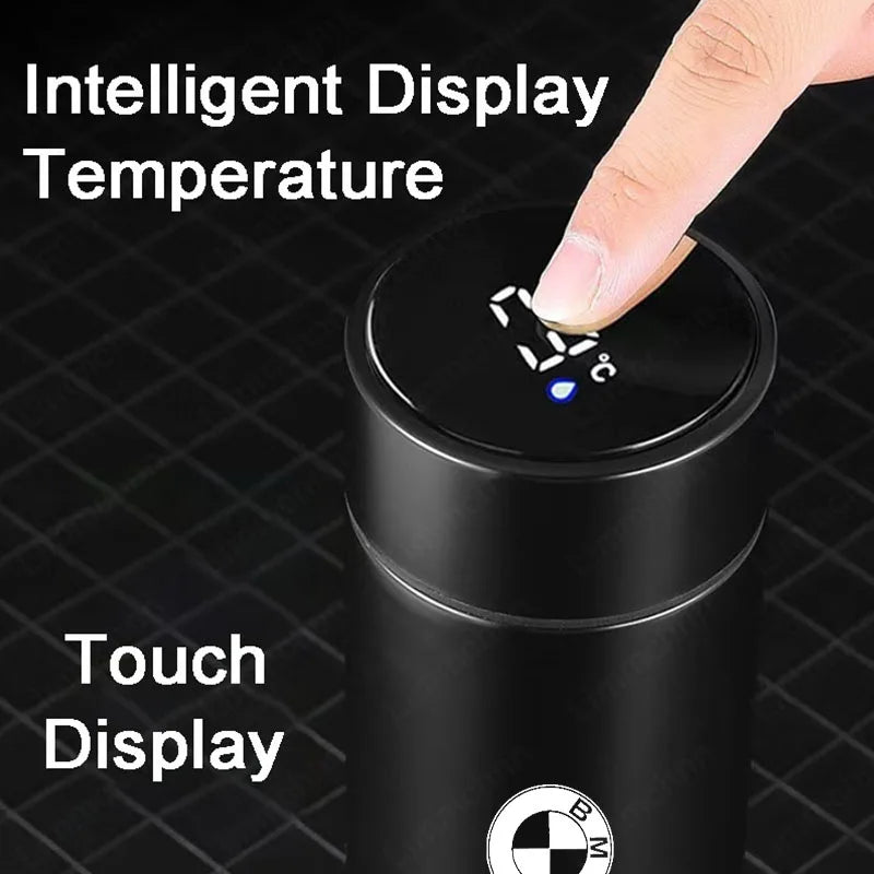 Person's hand operating touch sensor on BMW M Thermos Bottle.
