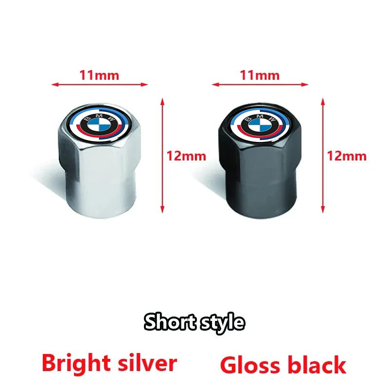 "Two sleek metal knobs, one featuring a black finish and the other a silver finish, set against a pristine white background."