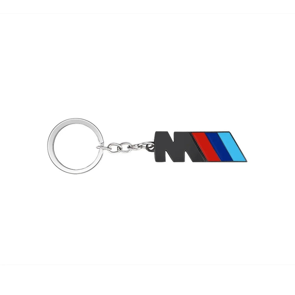 "BMW M Logo metal keychain for E36, E39, and E46 models. Authentic BMW accessory."