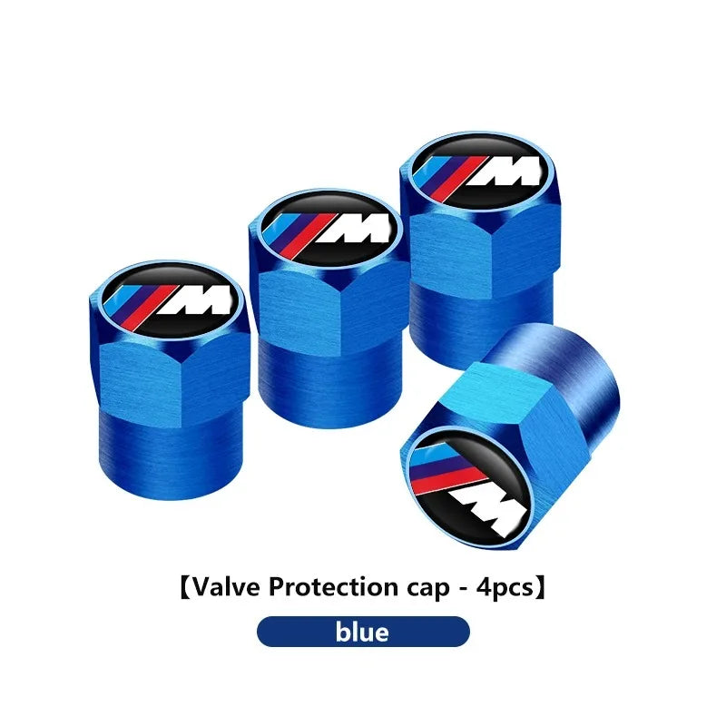 Set of 4 BMW M Logo tire valve stem caps in blue color.