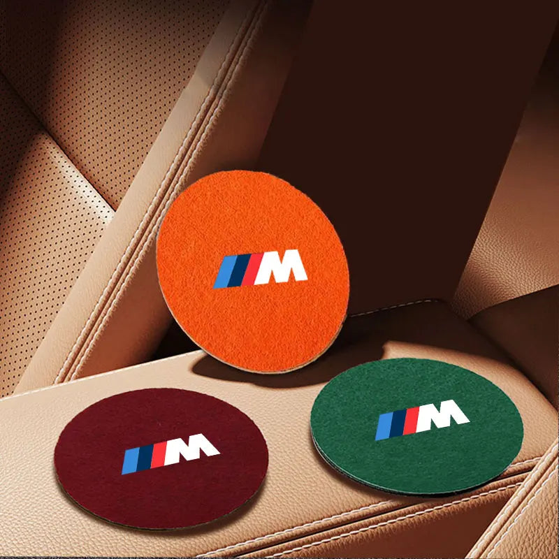 "BMW logo coaster set. Each coaster features the BMW automobile brand logo, making this set ideal for BMW enthusiasts or as a thoughtful gift."