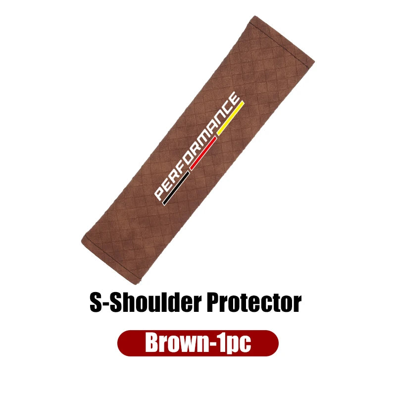 Brown leather cover for BMW seat belt shoulder pads.

Or, if you'd like to be more descriptive:
Brown leather cover for BMW E