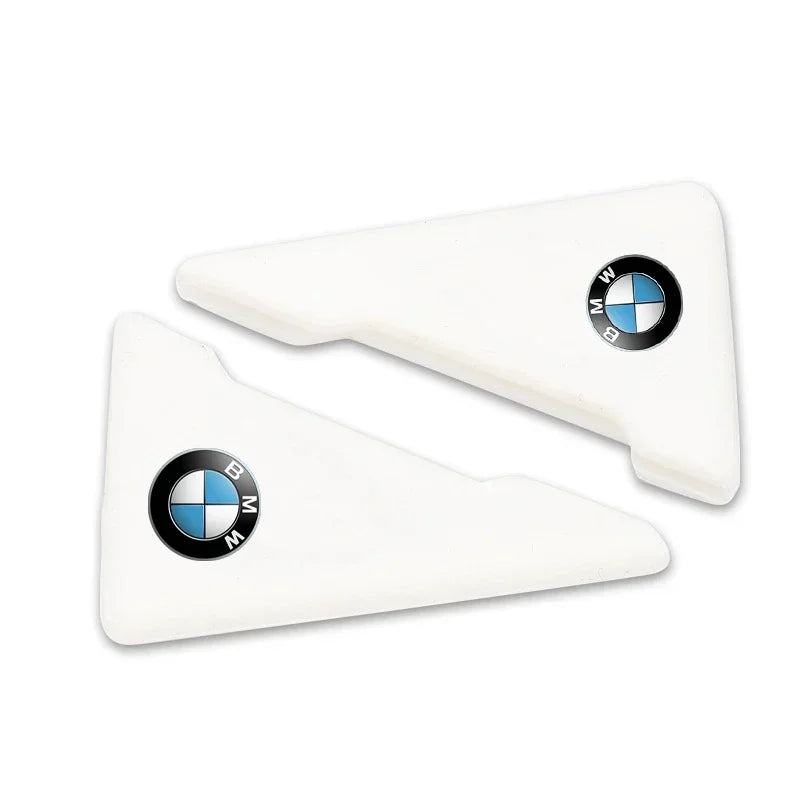 2 BMCS BMW M door corner guards: silicone anti-collision covers featuring BMW emblems.