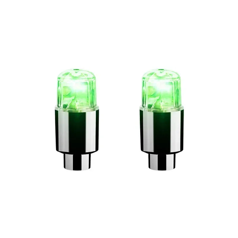 LED wheel lights - set of 2 with green bulbs. Fits valves on car, bike, or motorcycle. Upgrade your ride's glow.