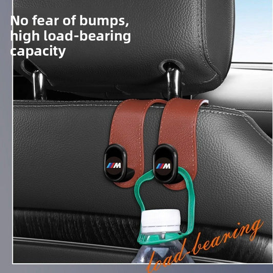 BMW E36, E39, E46: Hang car seat belts with this headrest hook accessory.