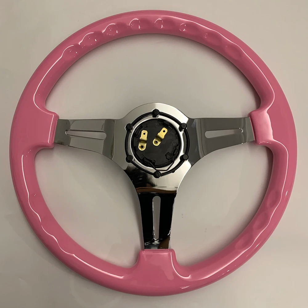 'Pink 14" ABS steering wheel with aluminum alloy frame - fits universal applications.'