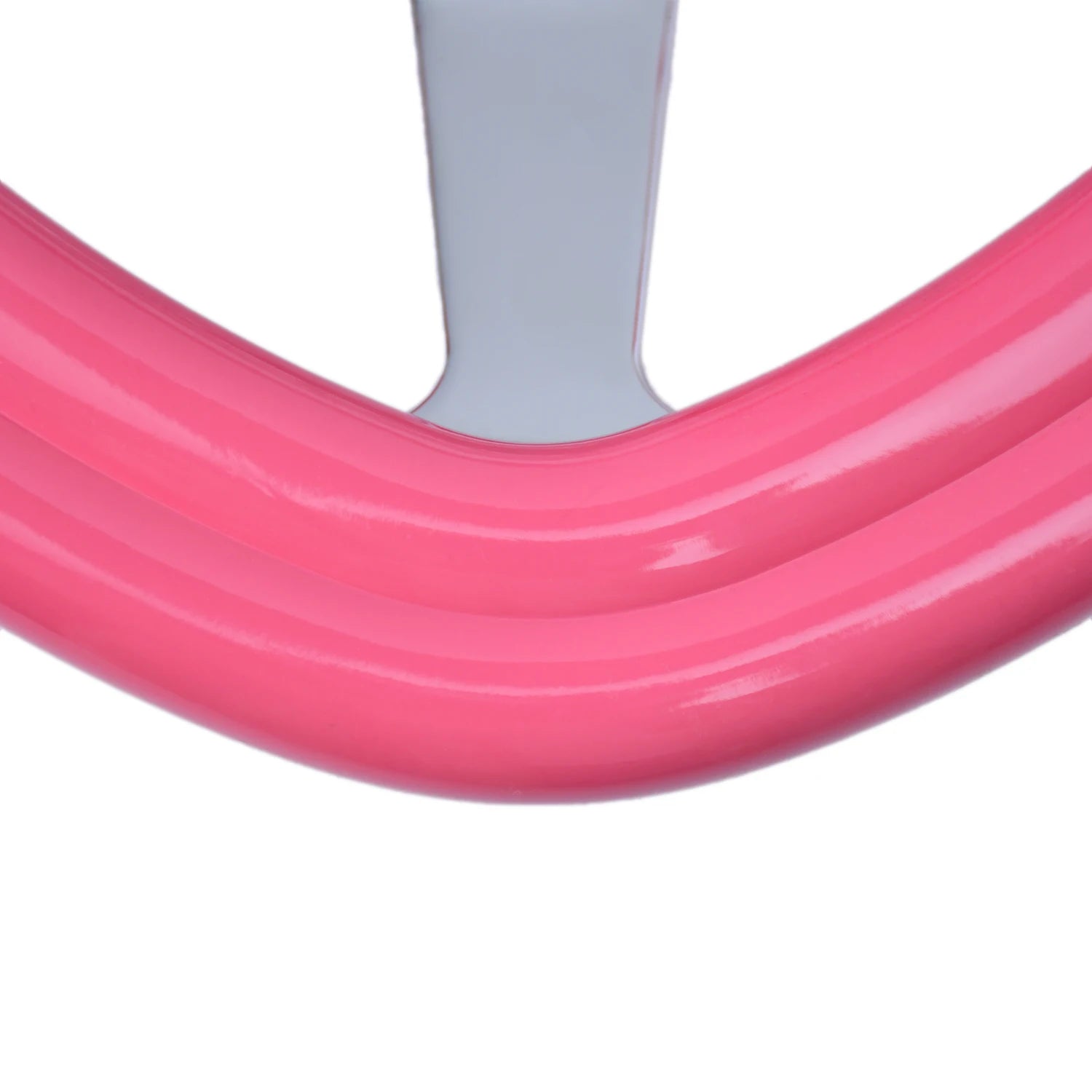 "Pink heart-shaped deep-dish steering wheel with white rim, made of ABS material."