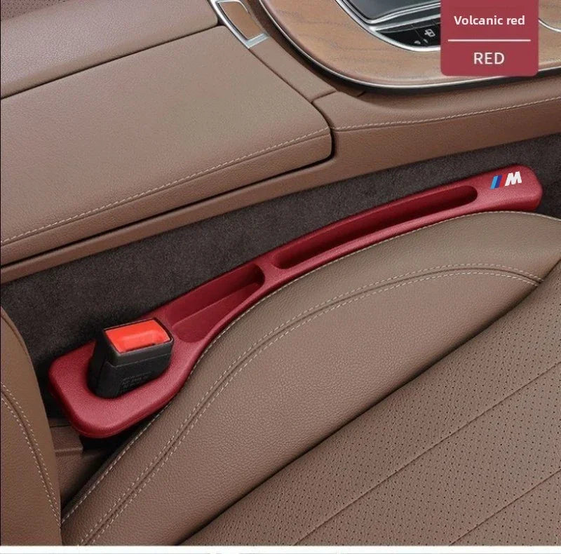 Two universal BMW seat gap fillers in red color.
(Note: This alt text is a simplified and professional description for an eco