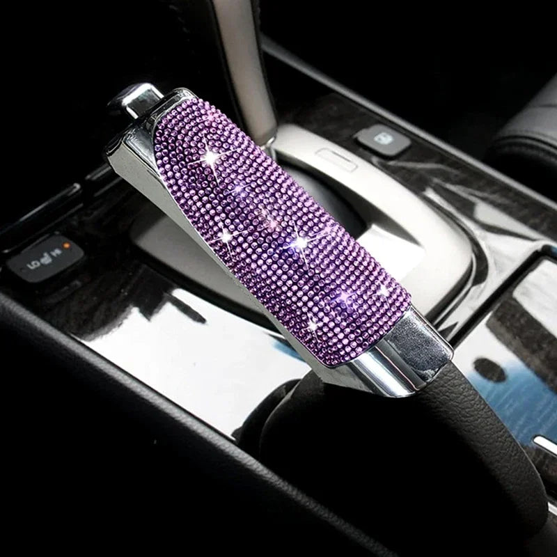 Universal fit diamond handbrake cover featuring purple rhinestone accents.

Or, if space allows for a more descriptive alt te