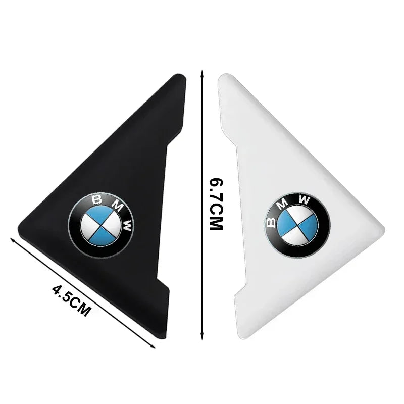 Two BMW M door corner guards: silicone anti-collision covers featuring authentic BMW logos.
