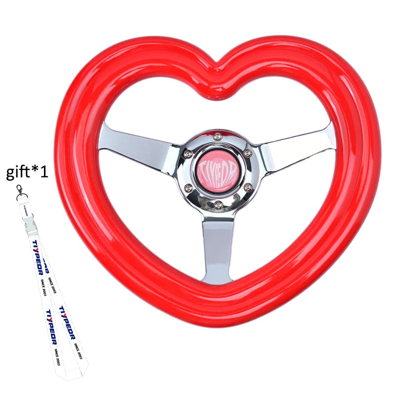 "Pink heart-shaped steering wheel cover with deep dish design and chrome spokes."