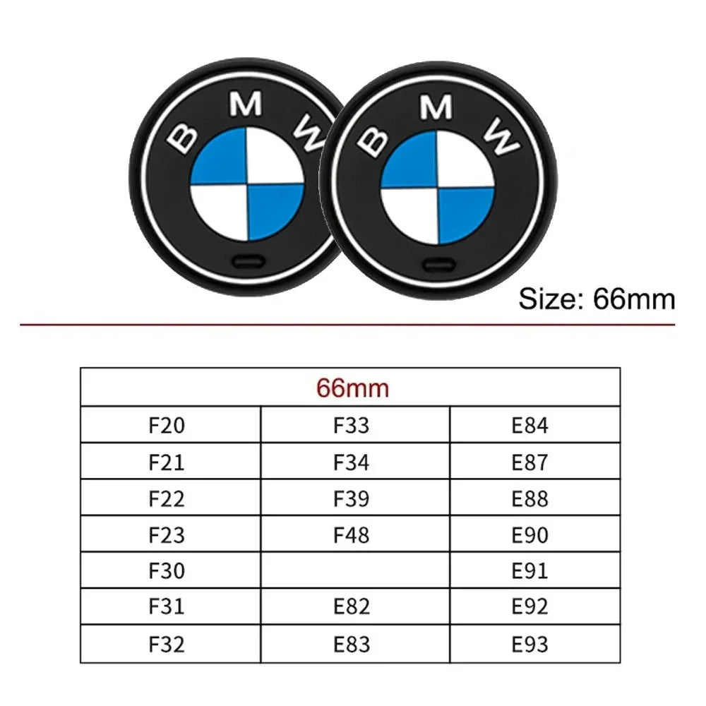 Two BMW M logo coasters for car cup holders. Authentic BMW emblem design.