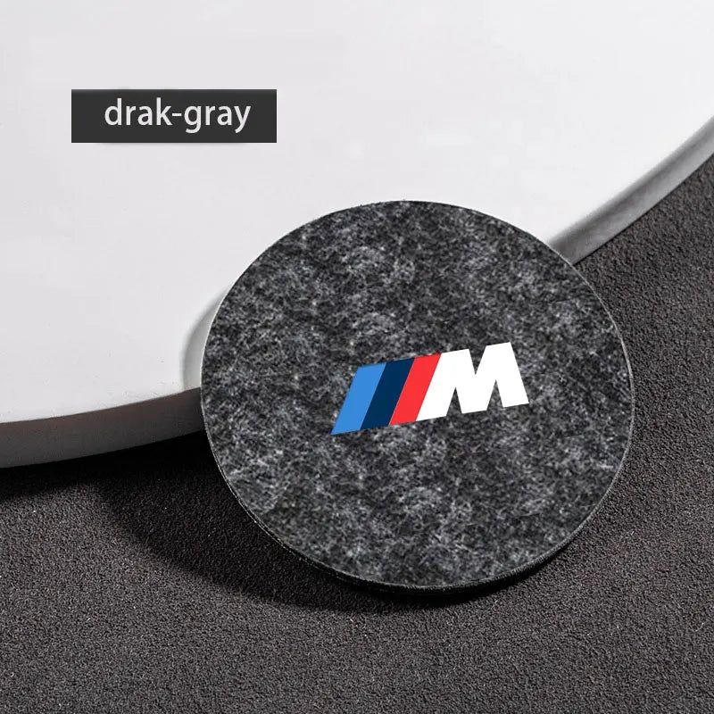 Monochromatic logo on a contrasting black background.