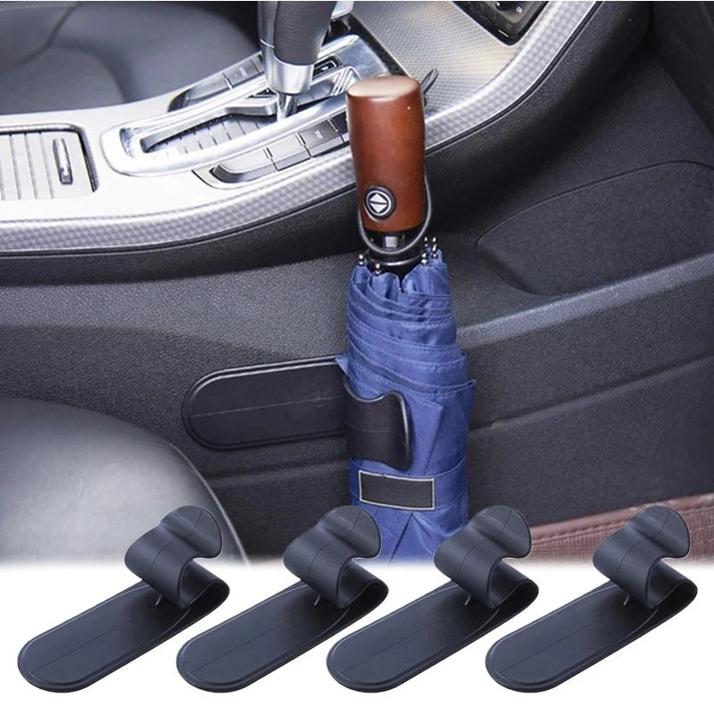 'Car trunk umbrella holder with 3 hooks. Fits most vents. Multifunctional mount.'