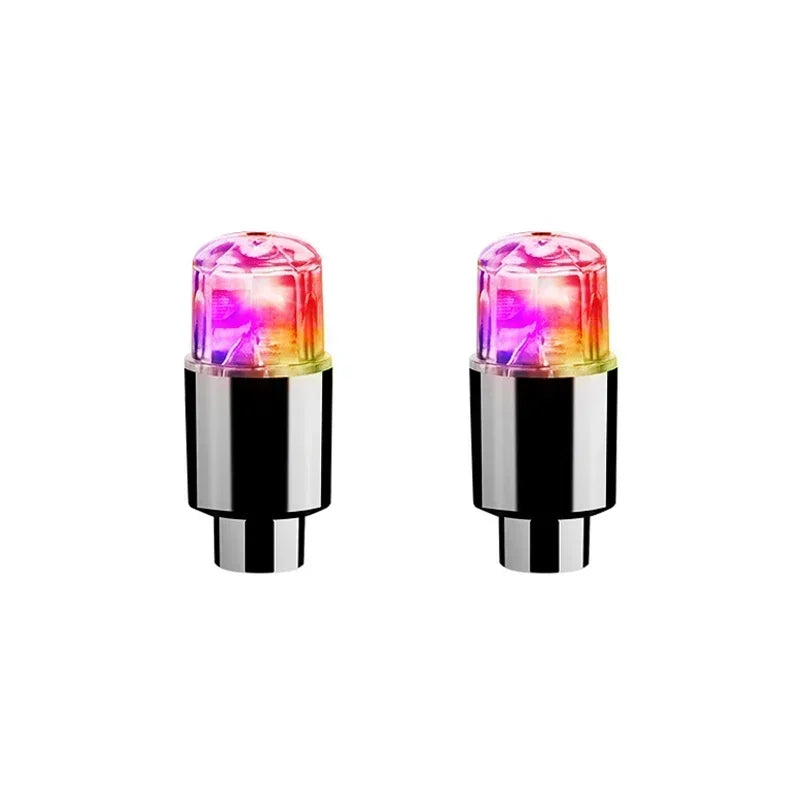 'Pink/Purple LED wheel lights — fits valves on car, bike, or motorcycle. Two-pack accessory.'