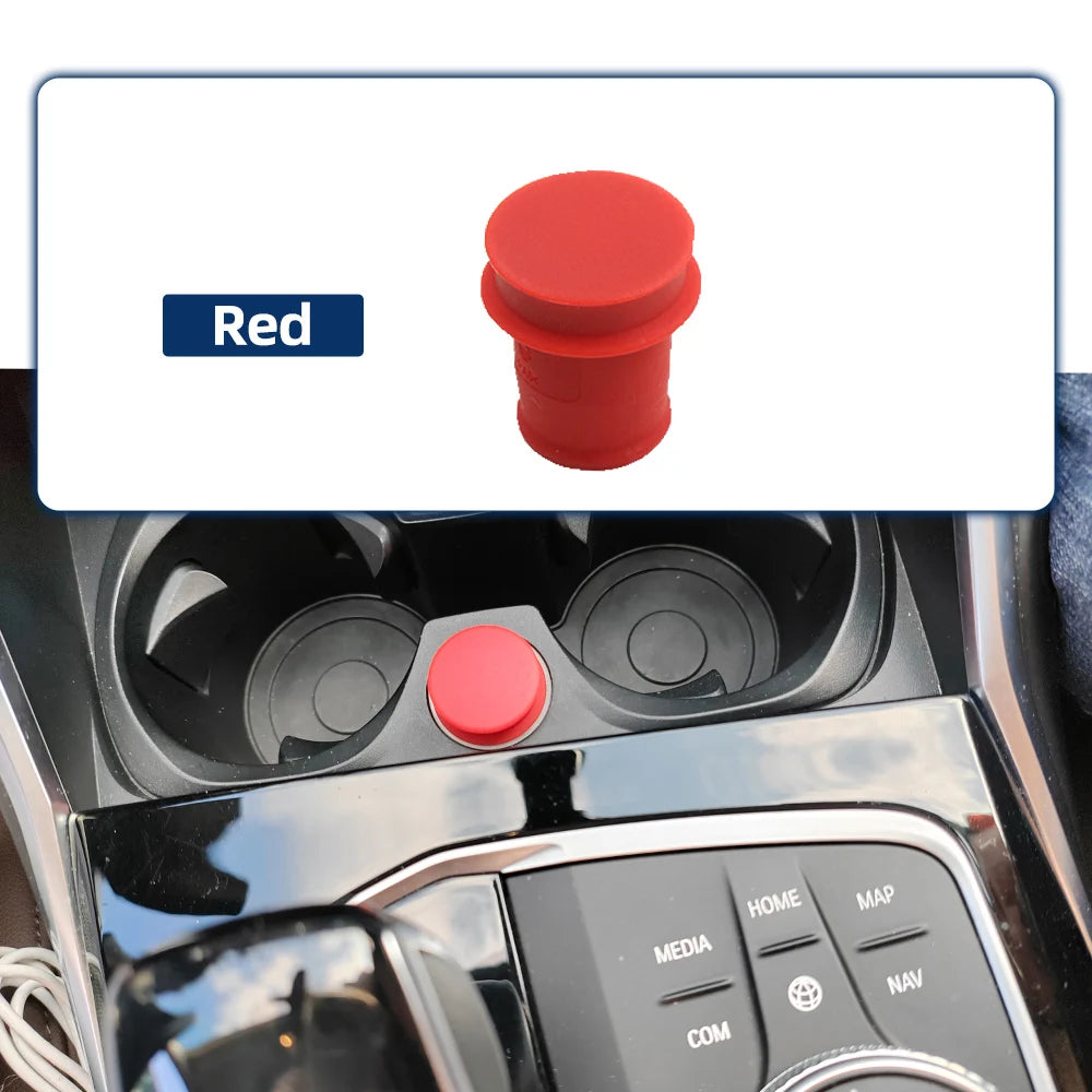 Red knob: Controls various functions in the vehicle dashboard.
