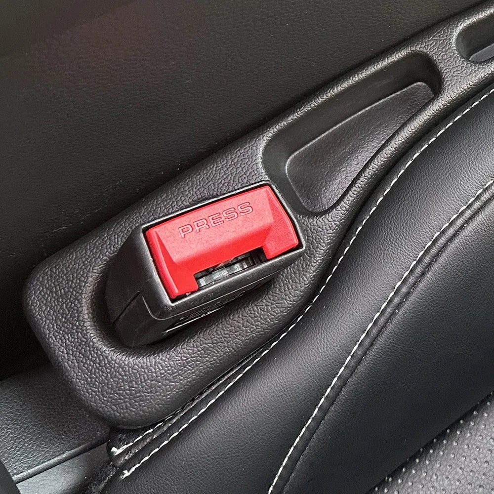 Red center console button (for reference only, not a car seat accessory)