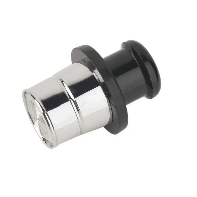 Black-and-silver metal knob disguising pill box in car lighter. Sleek concealment for valuables. Product: Secret Stash Car Li