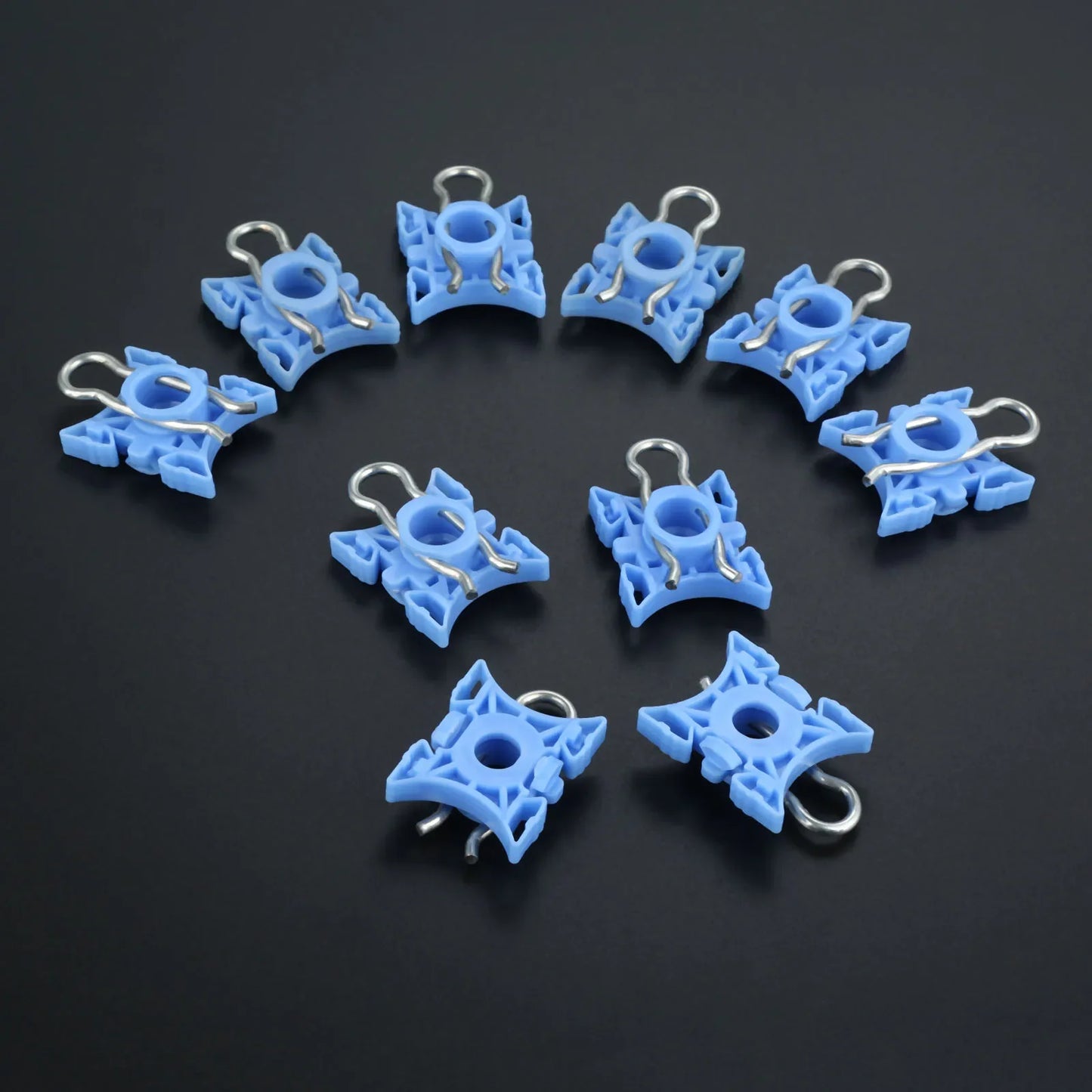 Ten pieces of blue plastic connector clips for BMW E36 window regulators.