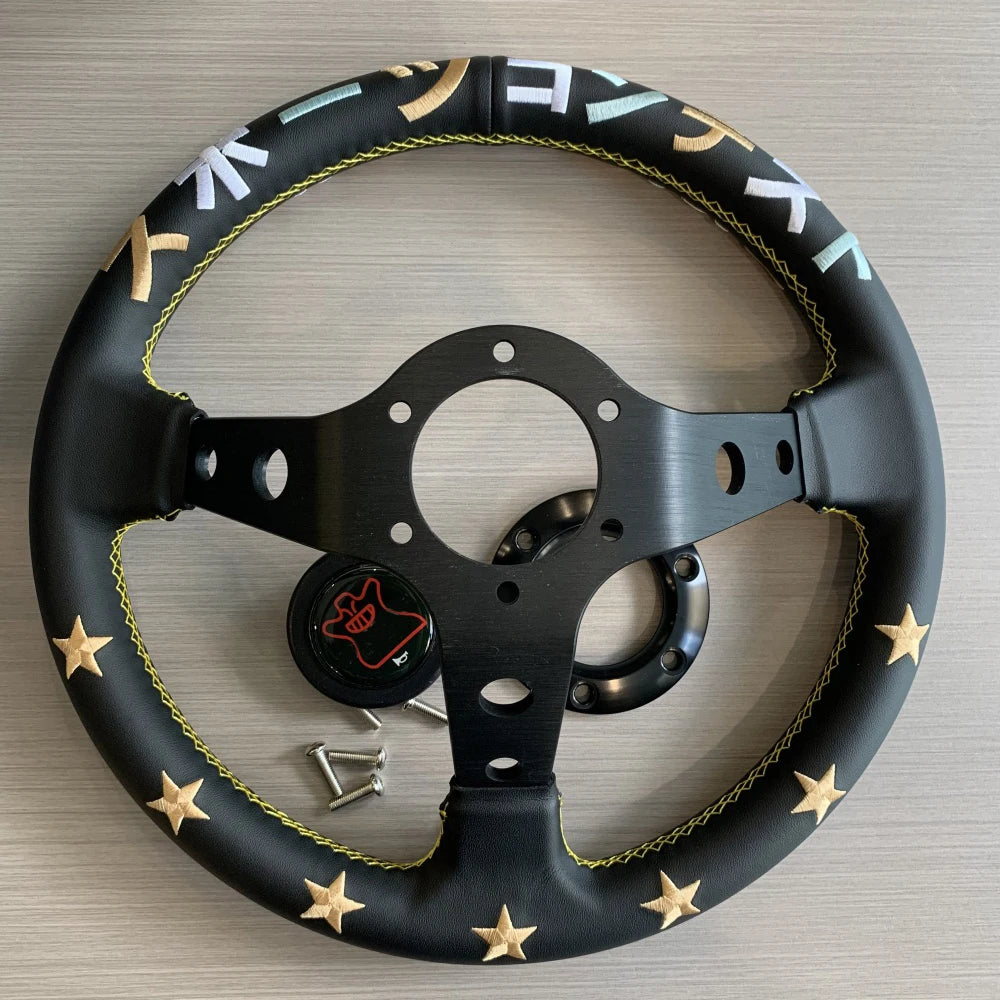 JDM-style microfiber steering wheel with black embroidered star pattern on deep-dish leather. Measurements: 330mm. Fits OEM o