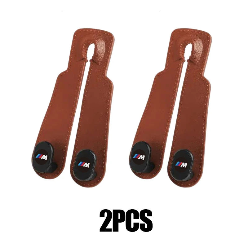 "BMW E36, E39, E46 car seat headrest hooks with genuine leather handle covers."