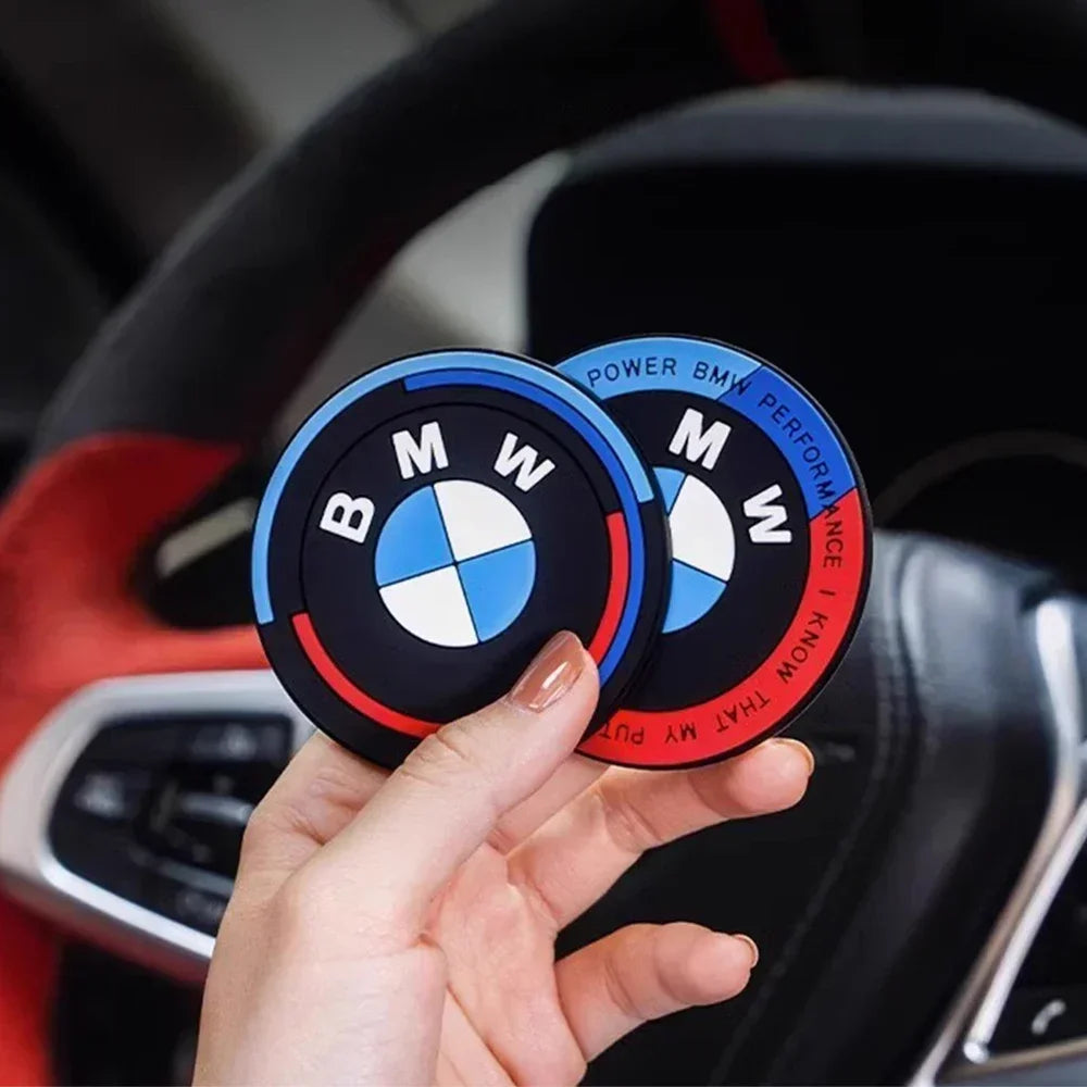 BMW M logo coasters for cup holders - 2 pieces.

(Note: The alt text does not mention "air freshener" as the product descript