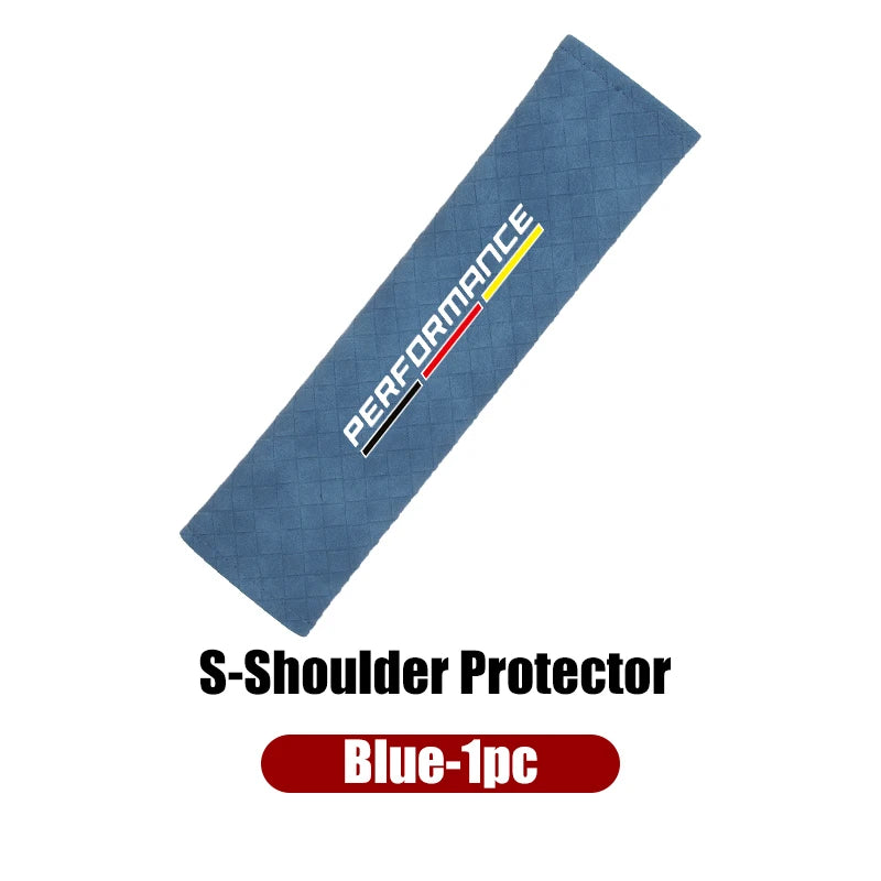 Blue upholstered seat belt shoulder pad cover for BMW E36, E39, and E46 models. Enhances comfort and protects against heat an
