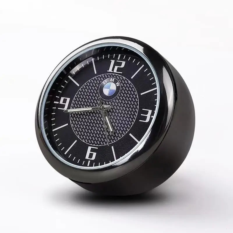 Black quartz clock with a white numerals display for BMW center console mount.