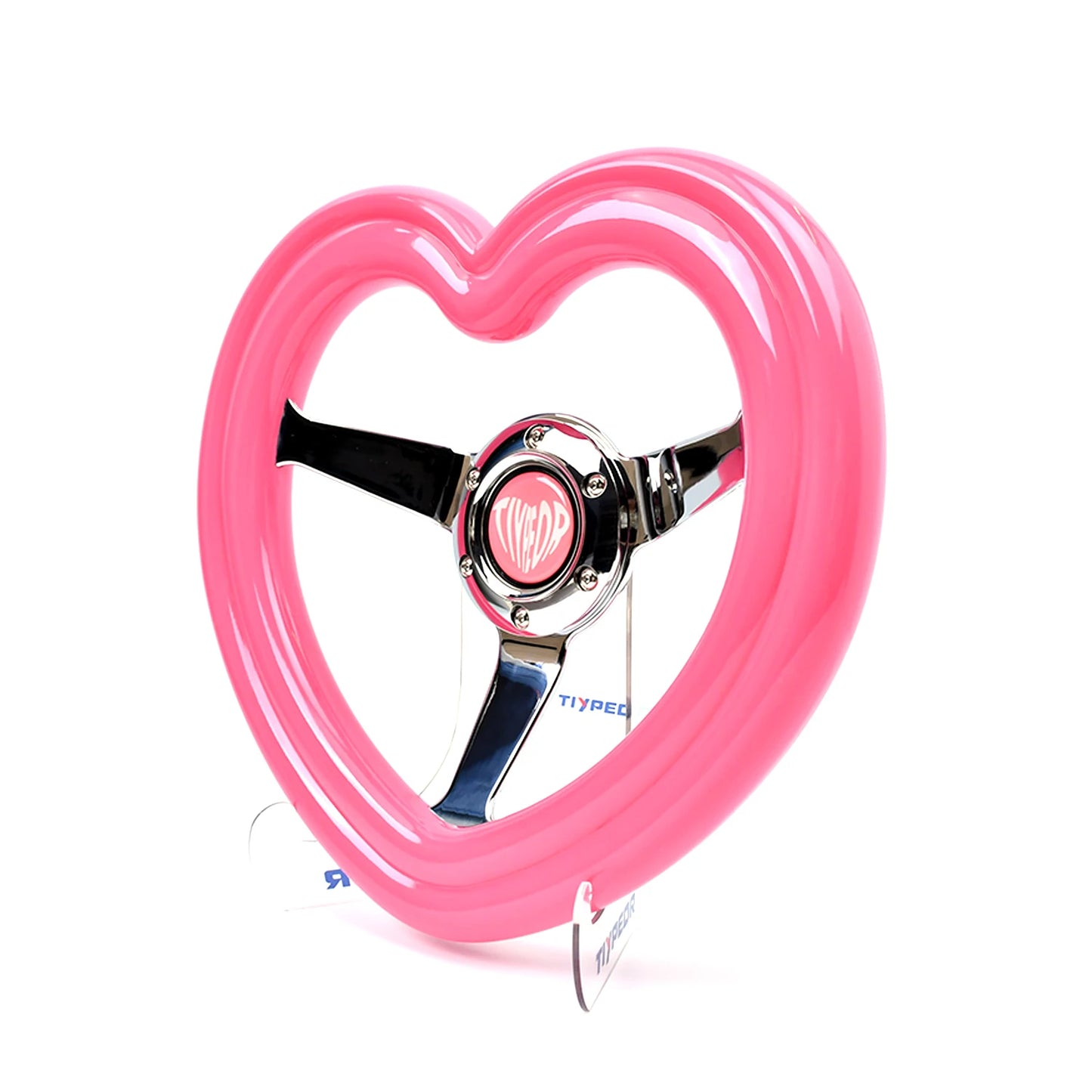 "Pink heart-shaped deep dish steering wheel with ABS material and diameter of 320mm, attached to a 40mm black overlay."