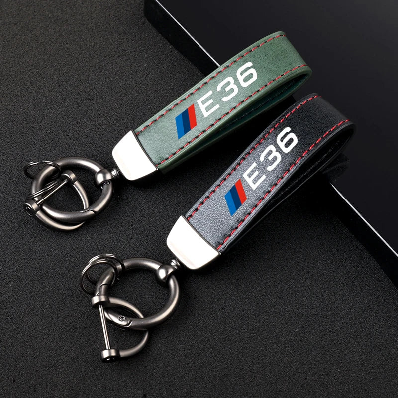 "BMW Logo leather keychain set for E36, E39, and E46 models, includes two keychains and attachments."