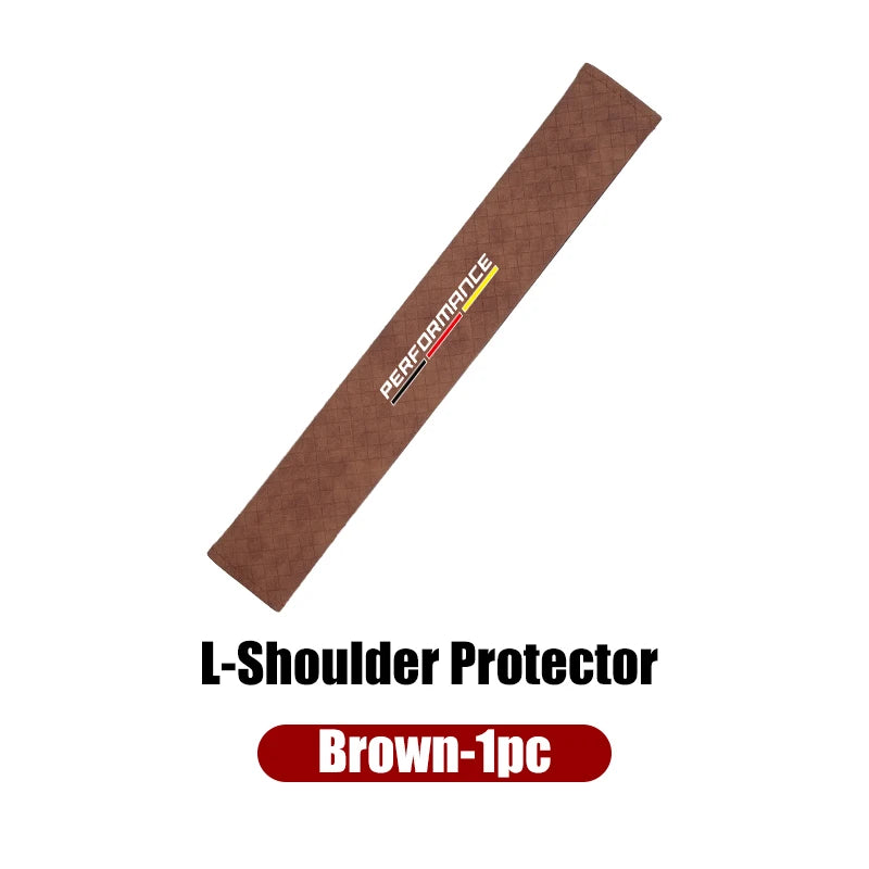 Brown leather shoulder pad cover for BMW E36, E39, E46 vehicles. Adjusts to L-shaped seat belt mounts.